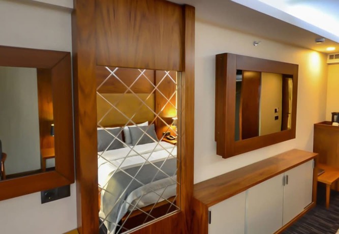 Imagen de la habitación del New Gate Hotel. Foto 9