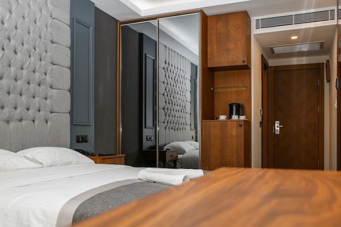 Imagen de la habitación del New Gate Hotel. Foto 10