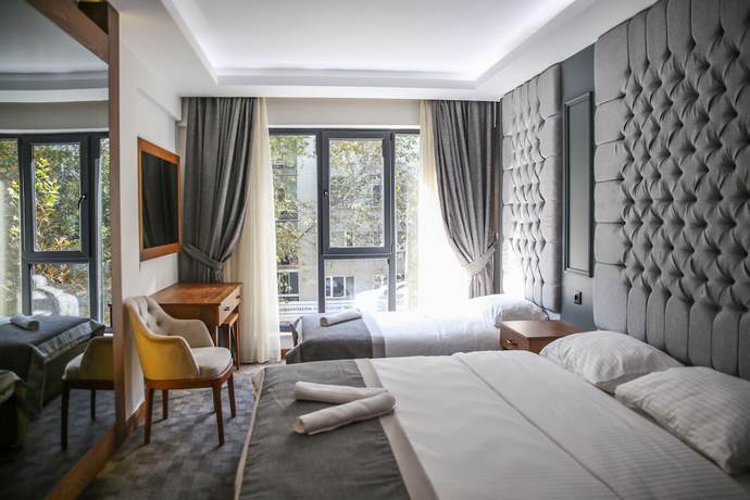 Imagen de la habitación del New Gate Hotel. Foto 12