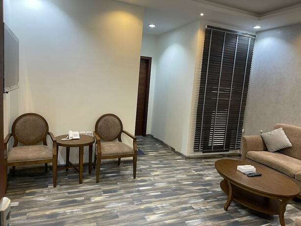 Imagen de la habitación del New Holiday Serviced Apartments. Foto 20