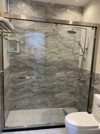Imagen general del New Holiday Serviced Apartments. Foto 17