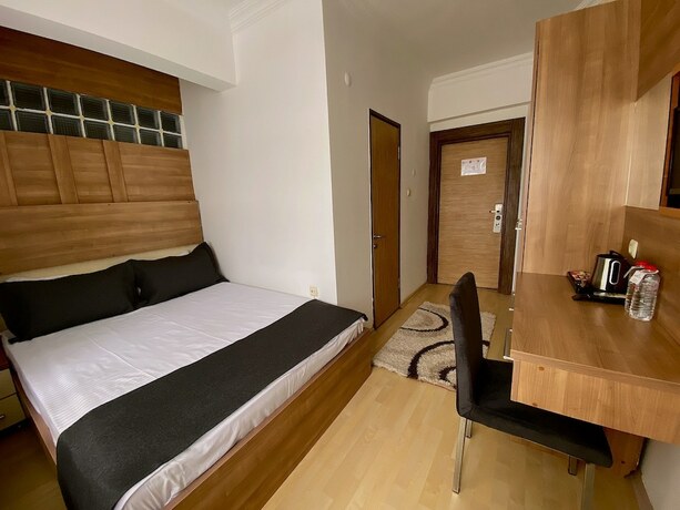 Imagen de la habitación del New Hotel Samsun. Foto 19