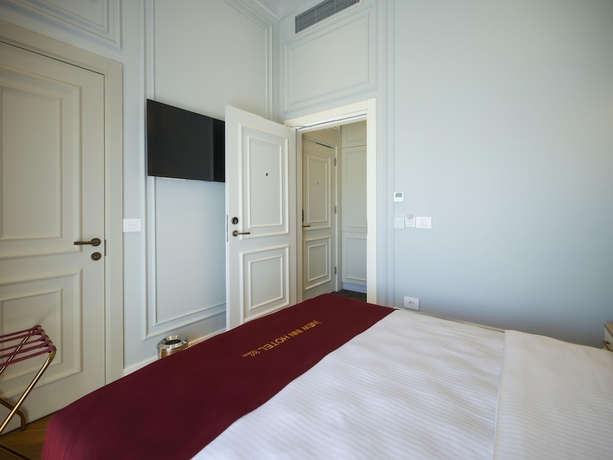 Imagen de la habitación del New Inn Hotel Old Town. Foto 17