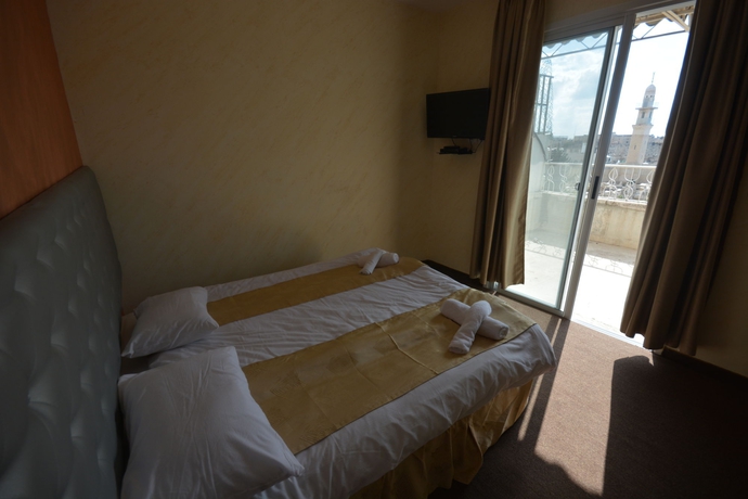Imagen de la habitación del New Metropole Hotel. Foto 7