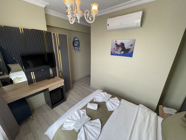 Imagen de la habitación del New Taksim Hotel. Foto 11