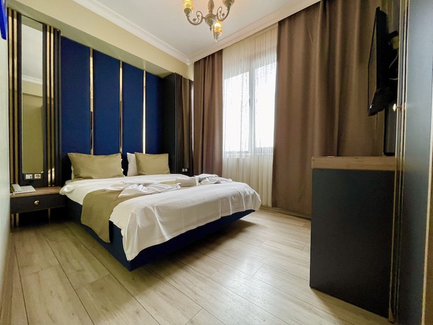 Imagen de la habitación del New Taksim Hotel. Foto 12