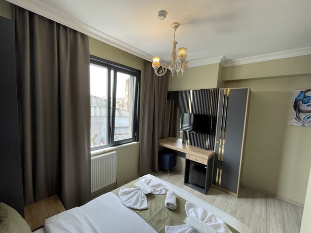 Imagen de la habitación del New Taksim Hotel. Foto 13