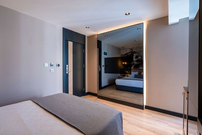 Imagen de la habitación del Ni Hotel Lara. Foto 13