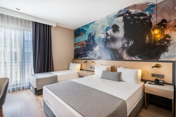Imagen de la habitación del Ni Hotel Lara. Foto 15