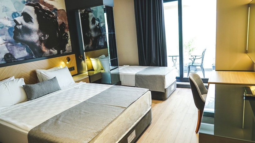 Imagen de la habitación del Ni Hotel Lara. Foto 16