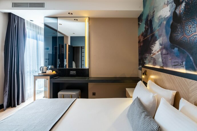 Imagen de la habitación del Ni Hotel Lara. Foto 19
