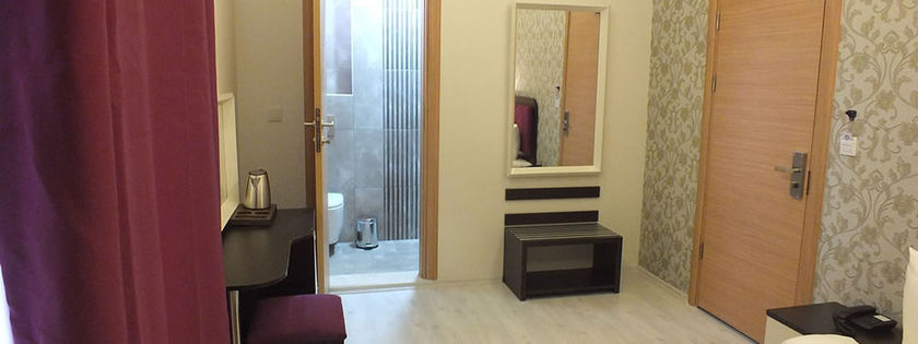Imagen de la habitación del Niconya Port Suiteandhotel. Foto 10