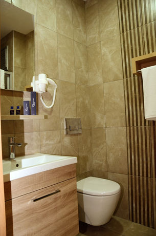 Imagen de la habitación del Niconya Port Suiteandhotel. Foto 12