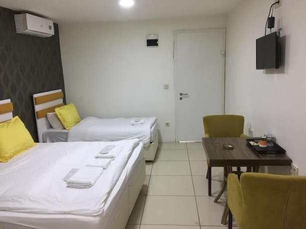 Imagen de la habitación del Nokta Suites Hotel. Foto 13