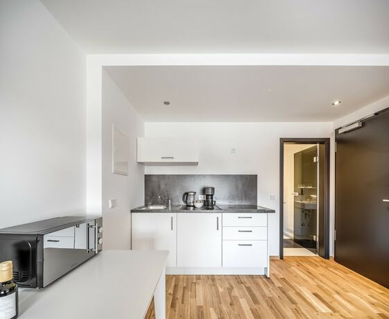 Imagen de la habitación del Nomad Serviced Apartments. Foto 16