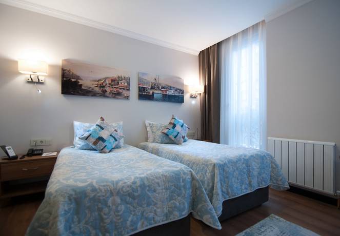 Imagen de la habitación del Nomade Hotel Exclusive. Foto 4
