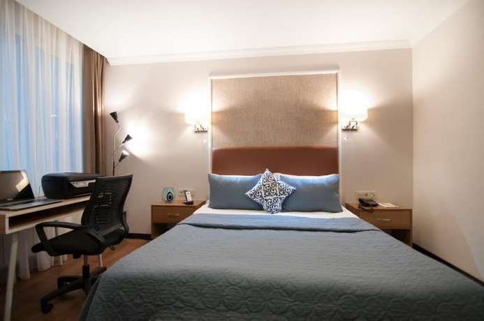 Imagen de la habitación del Nomade Hotel Exclusive. Foto 7