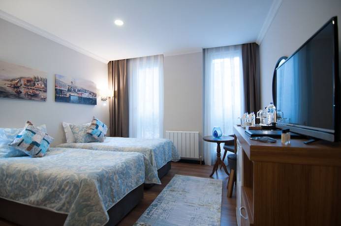 Imagen de la habitación del Nomade Hotel Exclusive. Foto 8