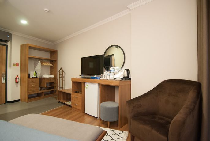 Imagen de la habitación del Nomade Hotel Exclusive. Foto 13