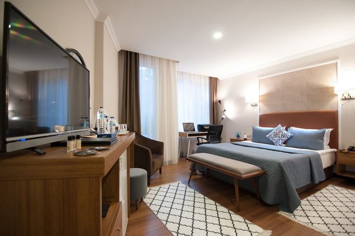 Imagen de la habitación del Nomade Hotel Exclusive. Foto 15