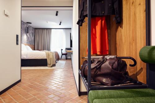 Imagen de la habitación del Nomadic Urban Premium Suites. Foto 9