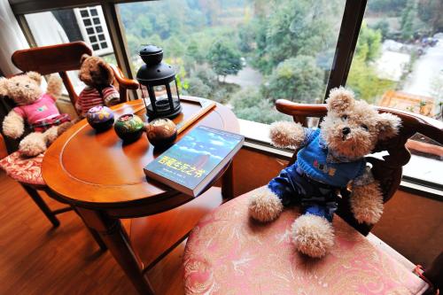 Imagen de la habitación del Nong Yue .emeishan Ju. Foto 7