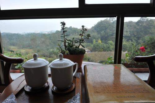 Imagen de la habitación del Nong Yue .emeishan Ju. Foto 8