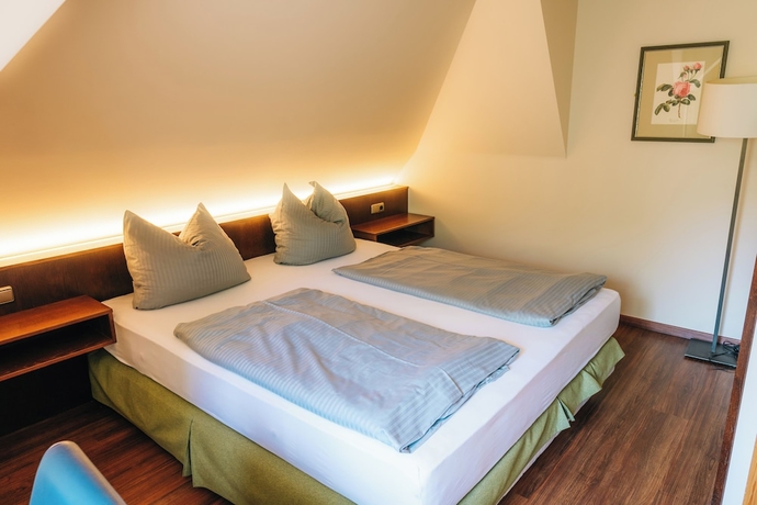 Imagen de la habitación del Noon Mirch Hotel Restaurant. Foto 7