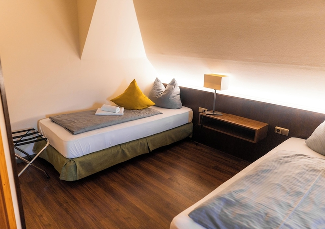 Imagen de la habitación del Noon Mirch Hotel Restaurant. Foto 11