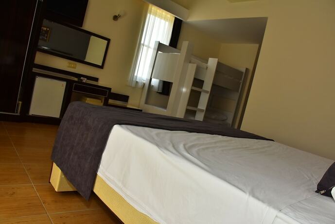 Imagen de la habitación del Nora Suit Hotel. Foto 18