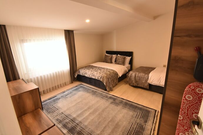 Imagen de la habitación del Nora Suite. Foto 17