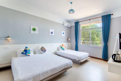 Imagen de la habitación del North Sea Weizhou Island A World Inn. Foto 4