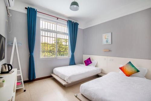 Imagen de la habitación del North Sea Weizhou Island A World Inn. Foto 5