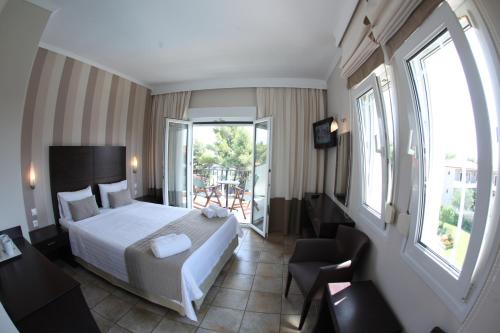 Imagen de la habitación del Nostos Hotel. Foto 6