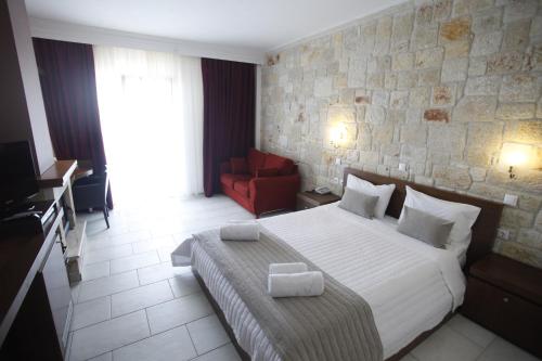 Imagen de la habitación del Nostos Hotel. Foto 7
