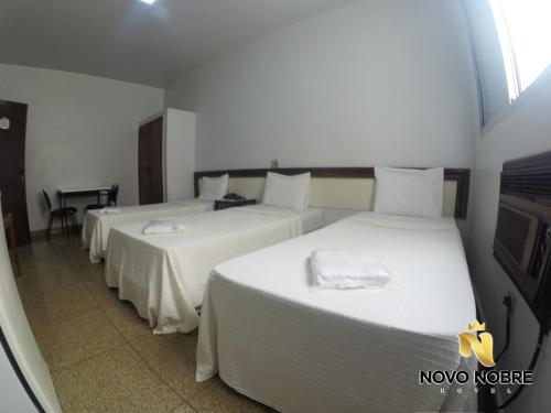 Imagen de la habitación del Novo Nobre Hotel. Foto 9
