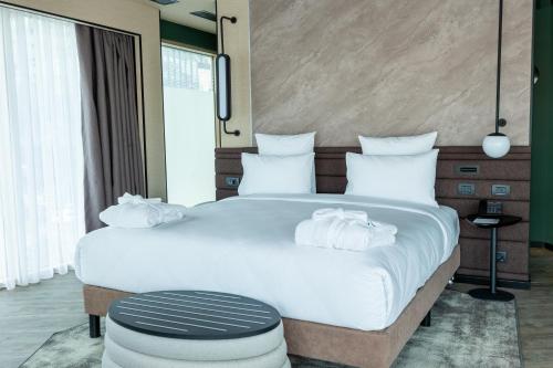 Imagen de la habitación del Novotel Istanbul Bomonti. Foto 15