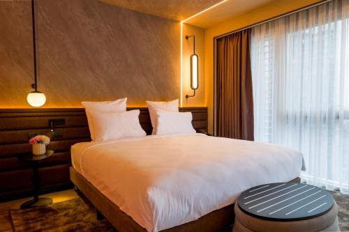 Imagen de la habitación del Novotel Istanbul Bomonti. Foto 20