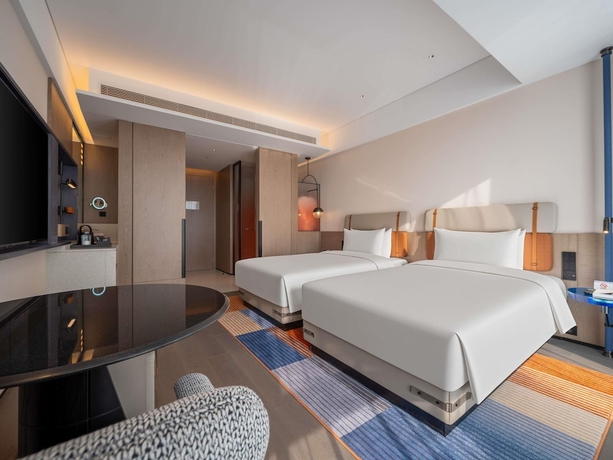 Imagen de la habitación del Novotel Zibo New Hongcheng. Foto 8