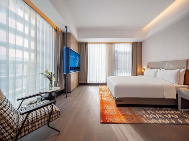 Imagen de la habitación del Novotel Zibo New Hongcheng. Foto 11