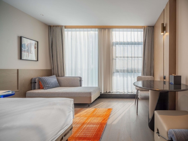 Imagen de la habitación del Novotel Zibo New Hongcheng. Foto 12