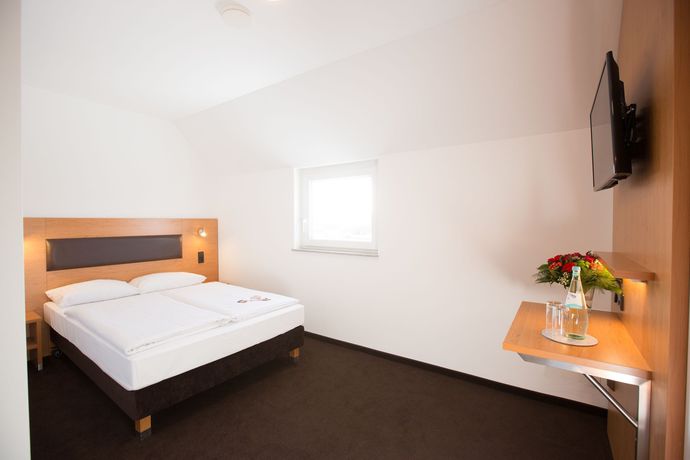 Imagen de la habitación del Novum Hotel Bruy. Foto 20