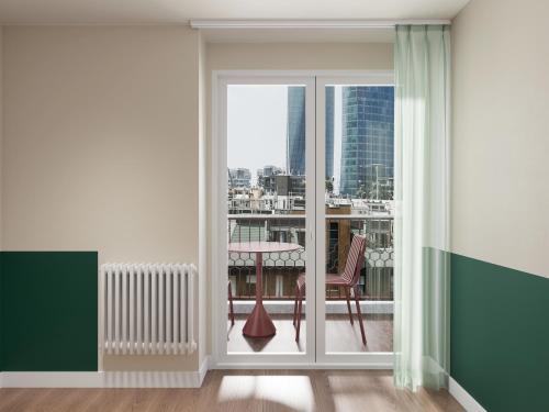 Imagen de la habitación del Numa Milan Sempione. Foto 7