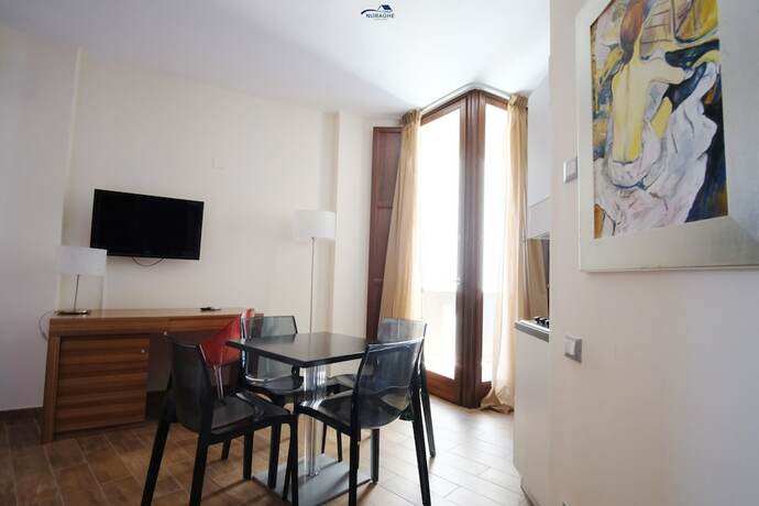 Imagen de la habitación del Nuraghe Apartments. Foto 13