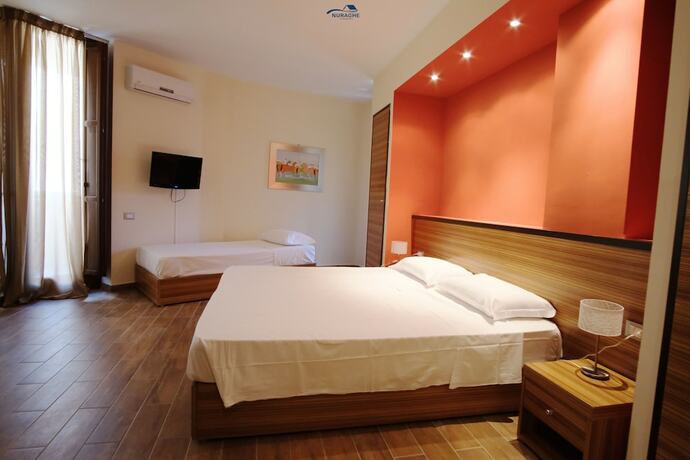 Imagen de la habitación del Nuraghe Apartments. Foto 15