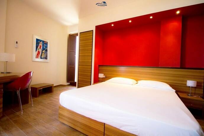 Imagen de la habitación del Nuraghe Apartments. Foto 16