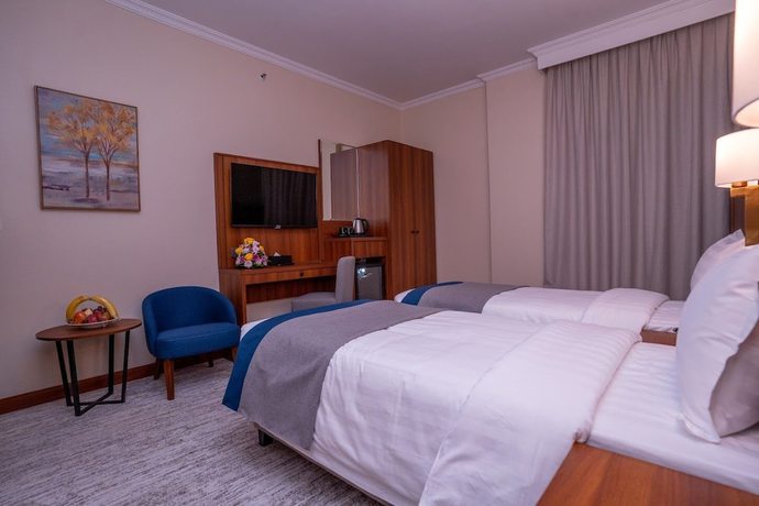 Imagen de la habitación del Nusk Al Hijrah Hotel. Foto 5