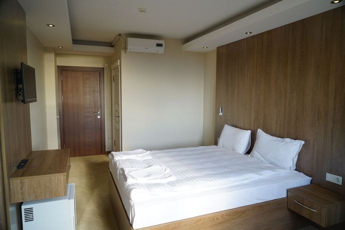 Imagen de la habitación del Ny World Hotel. Foto 4
