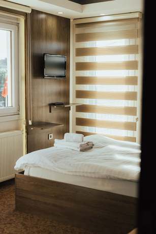 Imagen de la habitación del Ny World Hotel. Foto 8
