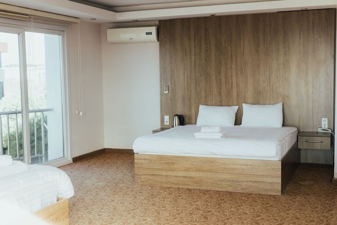 Imagen de la habitación del Ny World Hotel. Foto 9
